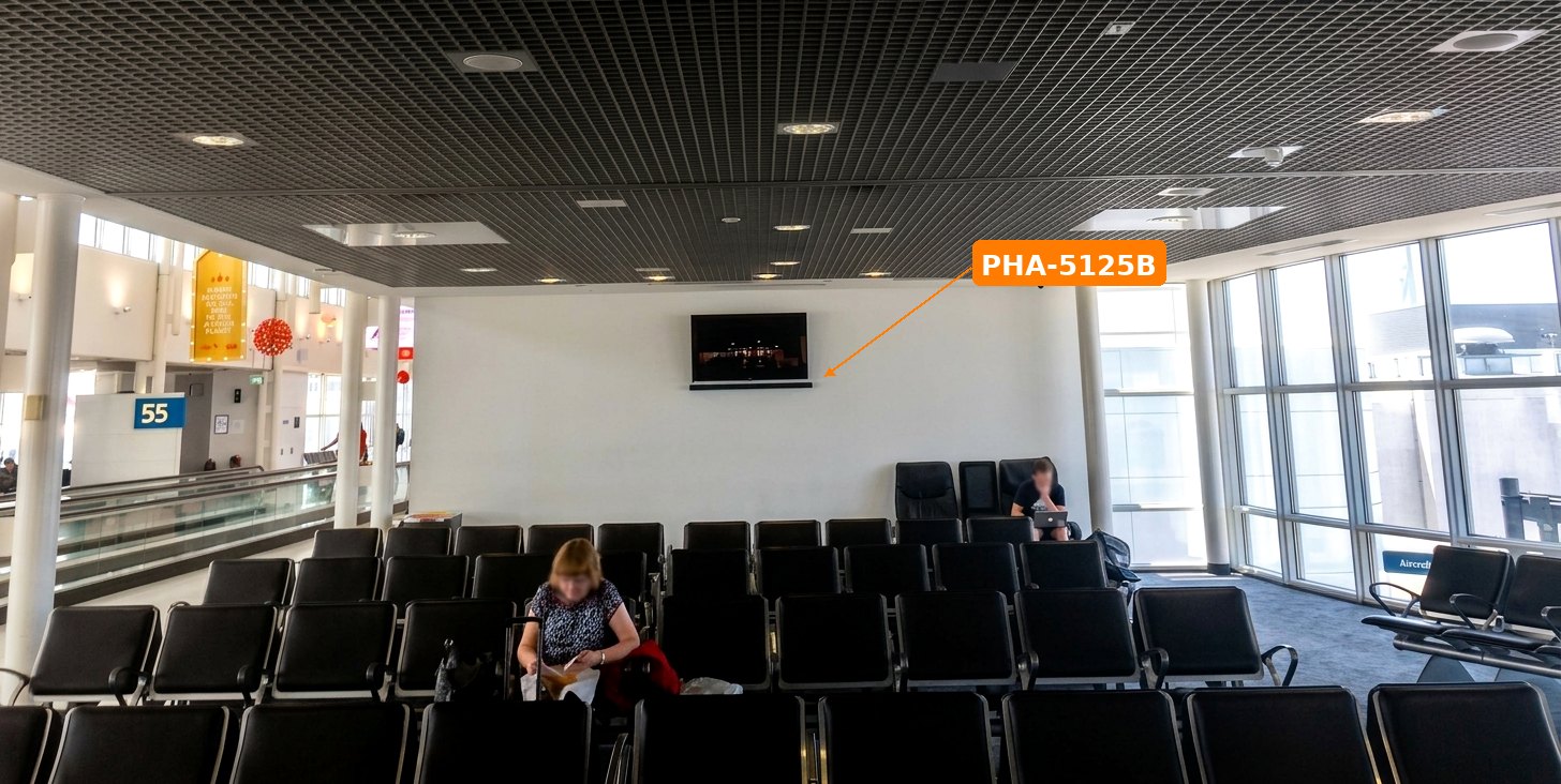 PHA-5125B beneath a departure-gate monitor at Sydney Airport Terminal 2